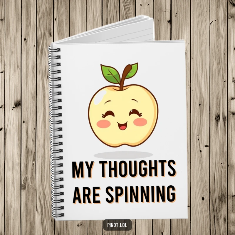 Funny notebook featuring a blushing apple character with simple eyes spinning enthusiastically. Ideal for capturing thoughts with a smile.